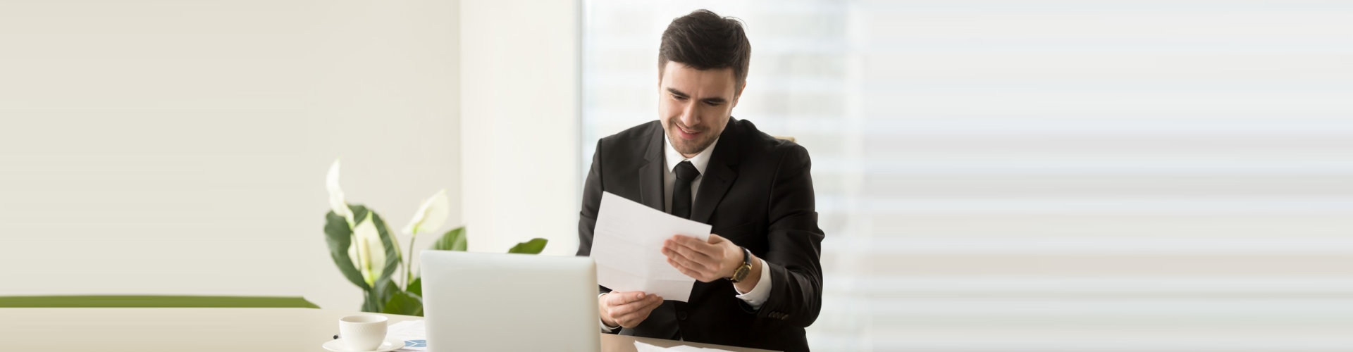 a man reading paper